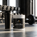 Drind Fuel Creatine Monohydrate 5000mg tub in a modern gym with shaker bottle and weights